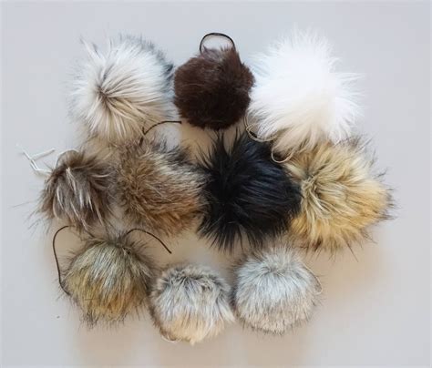 fur pom poms for hermes|faux pom poms for knitting.